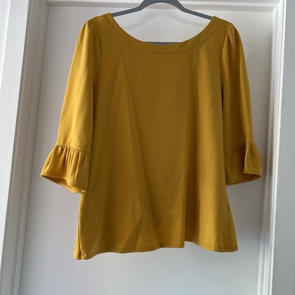 Mustard 3/4 sleeve blouse with cute ties in the back…. Make it yours today - Picture 2 of 3